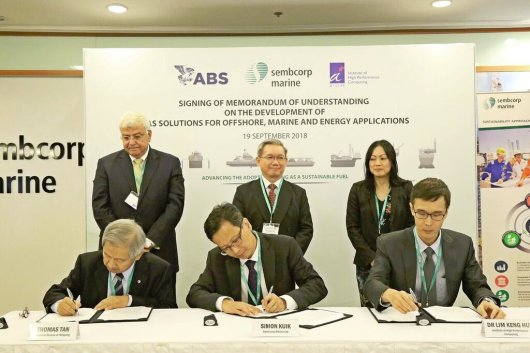 Seated from left: Thomas Tan, Vice President, Singapore & Malaysia, ABS; Simon Kuik, Vice President and Head of Research & Development, Sembcorp Marine; and Dr Lim Keng Hui, Executive Director, Institute of High Performance Computing; signing the MOU. The signing was witnessed by (standing, from left): Tony Nassif, Executive Vice President and Chief Operating Officer, ABS; Wong Weng Sun, President & CEO, Sembcorp Marine; and Dr Hazel Khoo, Deputy Executive Director, A*STAR's Science and Engineering Research Council.