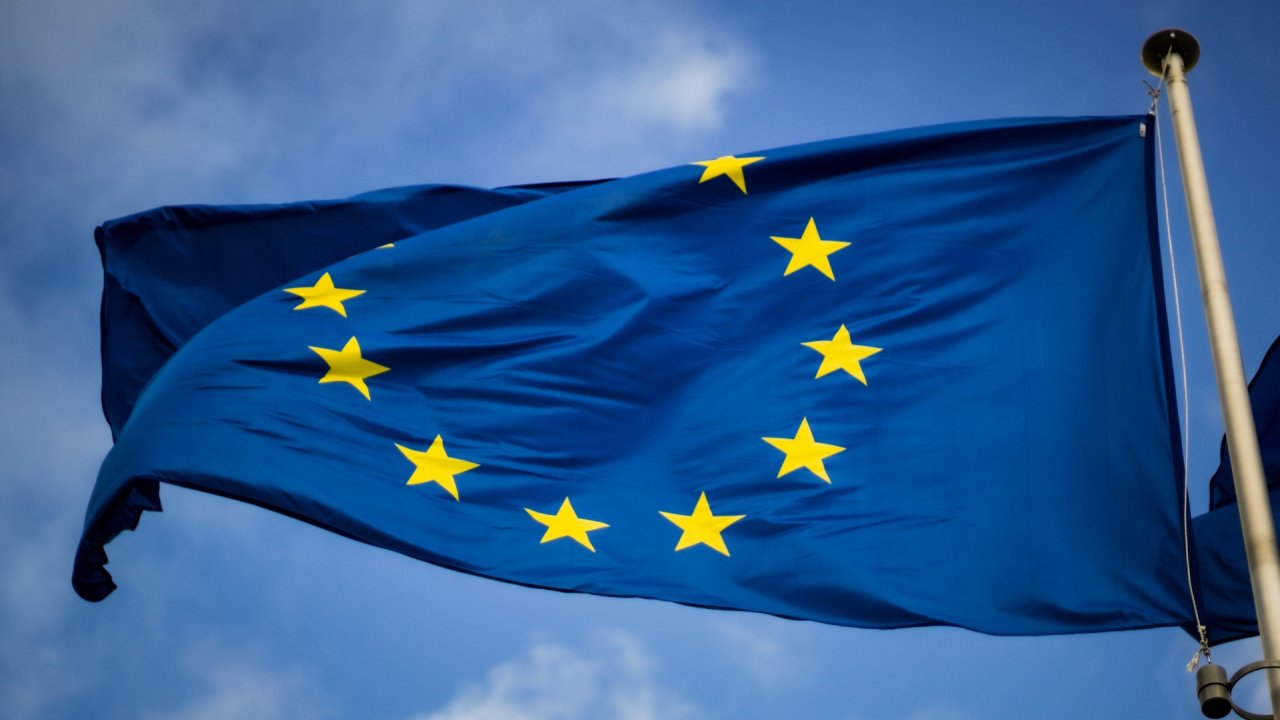 Flag of the European Union in front of the EU Parliament in Brussels, Belgium.