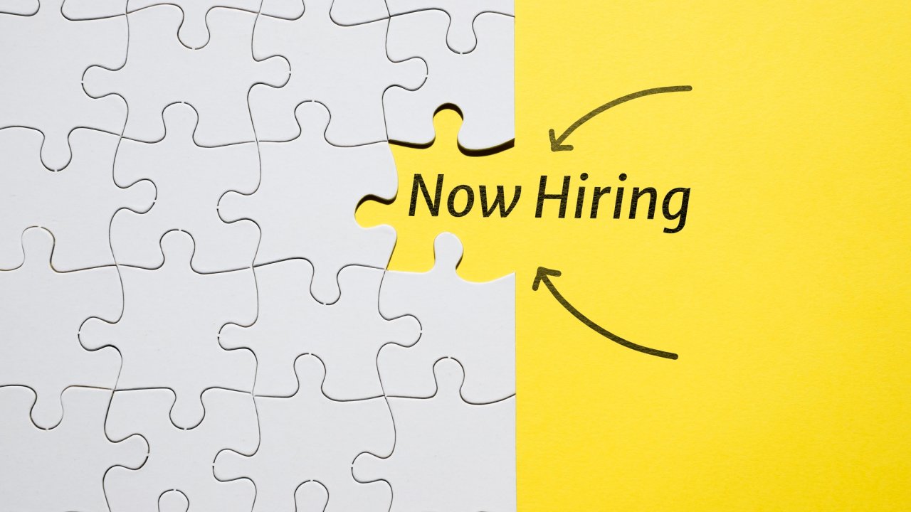 Hiring concept with puzzle pieces.