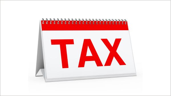Desk calendar with the word “TAX”.