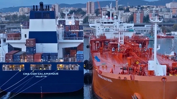 CMA CGM Salamanque vessel alongside Edison's Ravenna Knutsen vessel.