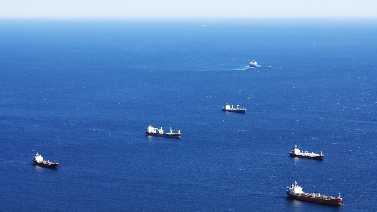 Aerial photograph of ships at sea.