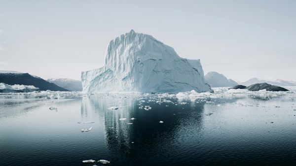 Iceberg floating in Arctic waters.