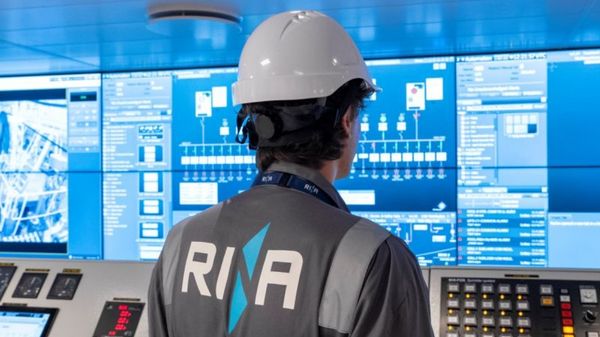 RINA employee in control room.