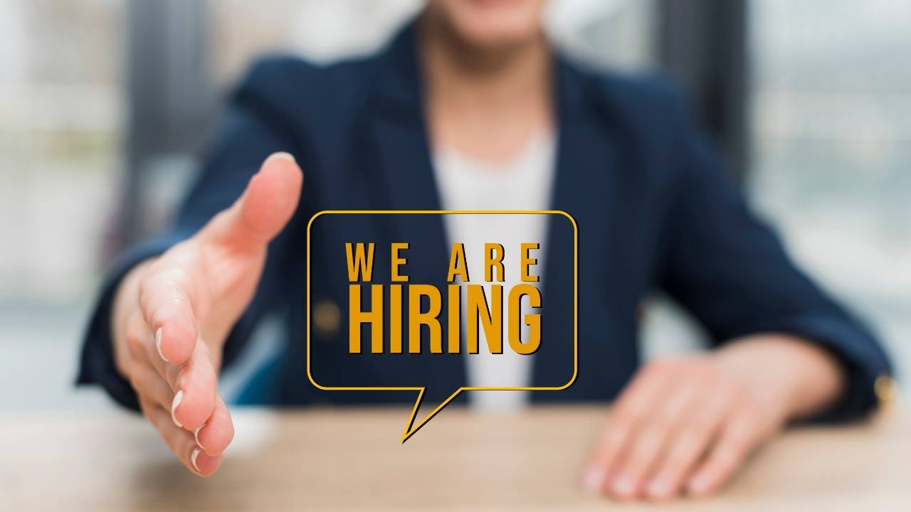 We are hiring graphic message with a handshake gesture.