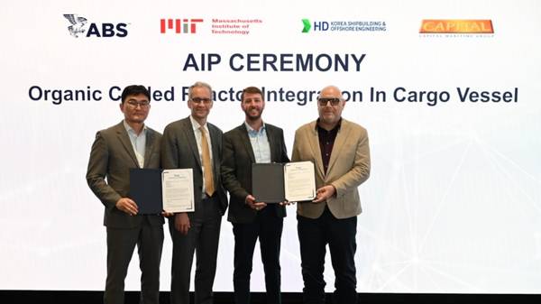 AiP award ceremony for nuclear reactor integration in cargo vessel design.