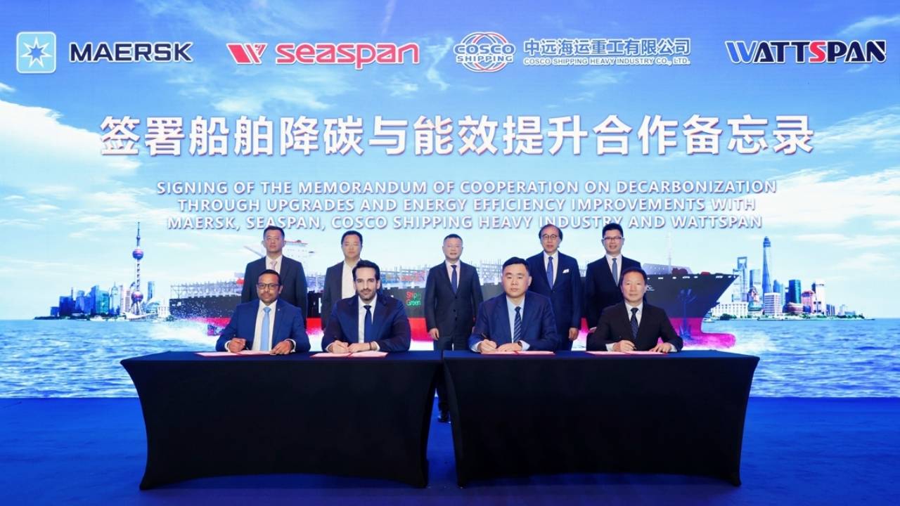 Seaspan and Maersk signing.